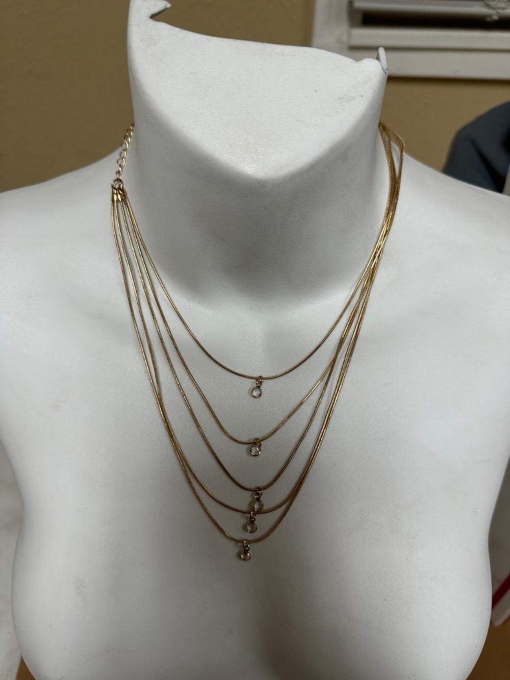 ##101, Guess/Marciano Gold-Tone Layered Crystal Drop Necklace